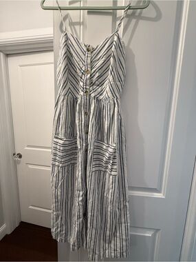 valerie asymmetrical lace maxi dress Introducing Valerie: modern, striking, and spirited. Her base dress is a  sleek affair, pairing a straight neckline + side cutouts with a snatched  mermaid skirt  all made in seriously eye-catching floral